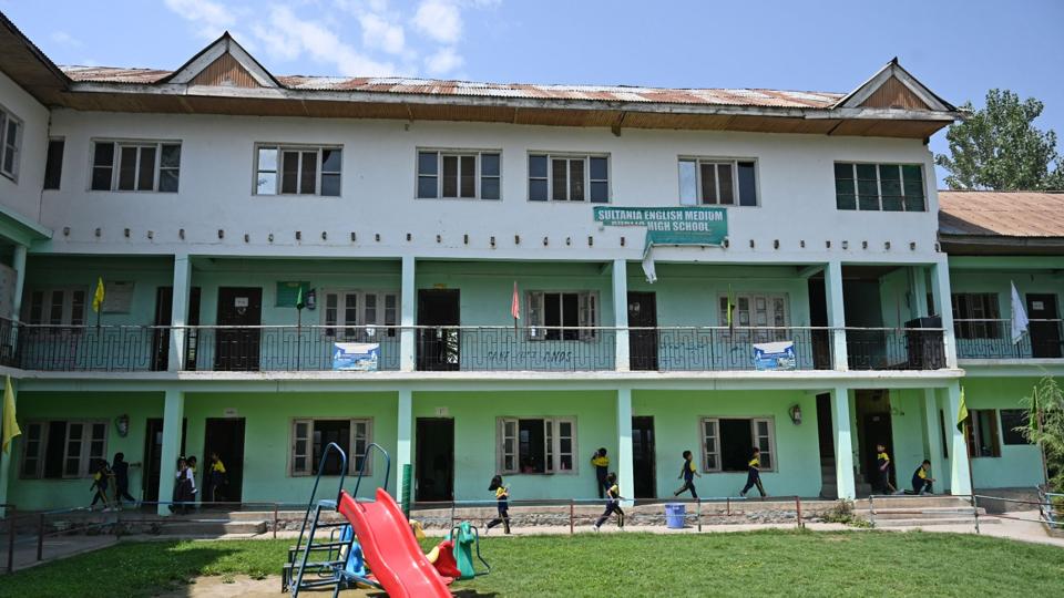 Students playing in the compound of Sultana English Medium School at a village in Ganderbal district on Saturday. (Waseem Andrabi/HT)