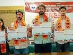 ABVP national secretary Aditya Takiar (centre) with party members during the manifesto release on Saturday. (HT Photo)