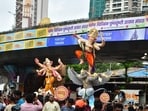 Idols of Lord Ganesh being carried from the workshop ahead of the Ganesh Chaturthi festival in Mumbai on Sunday.