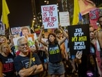 People take part in a protest demanding the end of the war and immediate release of hostages held by Hamas in the Gaza Strip, and against Prime Minister Benjamin Netanyahu's government in Tel Aviv, Israel, Saturday, Aug. 23, 2025.