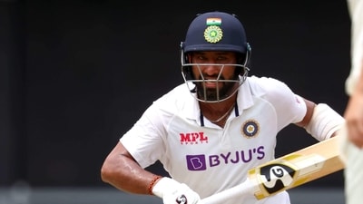 Cheteshwar Pujara runs between the wickets. (AFP) Cheteshwar Pujara runs between the wickets. (AFP)