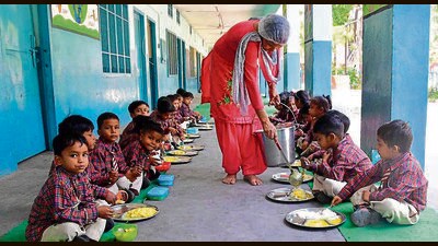 Despite repeated pleas, the concerned department has failed to release the cooking cost, forcing school heads and staff to dig into their own pockets for more than two months now. (HT Photo)