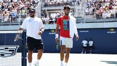 Carlos Alcaraz of Spain with his brother Alvaro Alcaraz as he walks to takes a break during a practice session ahead of the US Open (Getty Images via AFP) Carlos Alcaraz of Spain with his brother Alvaro Alcaraz as he walks to takes a break during a practice session ahead of the US Open (Getty Images via AFP)