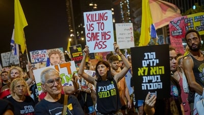 People take part in a protest demanding the end of the war and immediate release of hostages held by Hamas in the Gaza Strip, and against Prime Minister Benjamin Netanyahu's government in Tel Aviv, Israel, Saturday, Aug. 23, 2025. (AP)
