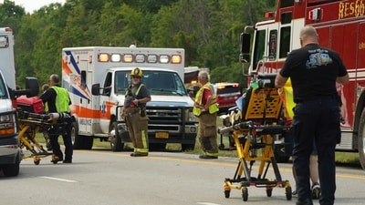 Rescue personnel work the scene of a tour bus that crashed and rolled over on the New York State Thruway near Pembroke, N.Y., Friday, Aug. 22, 2025. (Libby March/Buffalo News via AP) (AP) Rescue personnel work the scene of a tour bus that crashed and rolled over on the New York State Thruway near Pembroke, N.Y., Friday, Aug. 22, 2025. (Libby March/Buffalo News via AP) (AP)