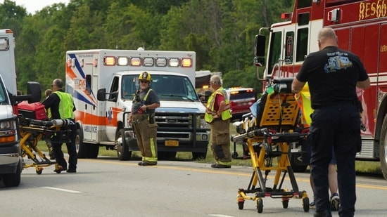 Rescue personnel work the scene of a tour bus that crashed and rolled over on the New York State Thruway near Pembroke, N.Y., Friday, Aug. 22, 2025. (Libby March/Buffalo News via AP) (AP)