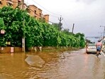 A waterlogged stretch outside Parkwood Glade in Sector 116, on Kharar-Landran highway, forced commuters to move to the wrong side of the road, severely disrupting traffic. (HT Photo) A waterlogged stretch outside Parkwood Glade in Sector 116, on Kharar-Landran highway, forced commuters to move to the wrong side of the road, severely disrupting traffic. (HT Photo)