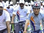 File image of Union Minister of Youth Affairs and Sports Mansukh Mandaviya riding a bicycle as part of the 'Fit India Sundays on Cycle' initiative. (PTI) File image of Union Minister of Youth Affairs and Sports Mansukh Mandaviya riding a bicycle as part of the 'Fit India Sundays on Cycle' initiative. (PTI)