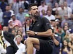 NEW YORK, NEW YORK - AUGUST 24: Novak Djokovic of Serbia hits balls into the crowd after defeating Learner Tien of the United States during their Men's Singles First Round match on Day One of the 2025 US Open at USTA Billie Jean King National Tennis Center on August 24, 2025 in the Flushing neighborhood of the Queens borough of New York City. 