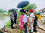 Mayor Inderjit Kaur during inspections in different areas of the city including the low lying areas alongside Buddha Nullah in Ludhiana on Monday. (HT Photo)