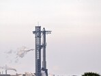 A SpaceX Super Heavy booster carrying the Starship spacecraft vents before the launch is scrubbed to allow for troubleshooting of a ground issue at the company's launch complex in Starbase, Texas, U.S., August 24, 2025. REUTERS/Steve Nesius