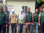 The two arrested sharpshooters on Monday. (ANI Video Grab) The two arrested sharpshooters on Monday. (ANI Video Grab)