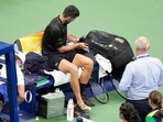 Novak Djokovic, of Serbia, sits on the bench during a match against Learner Tien, of the United States, in the first-round of U.S. Open Novak Djokovic, of Serbia, sits on the bench during a match against Learner Tien, of the United States, in the first-round of U.S. Open