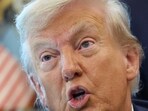 US President Donald Trump during the signing of executive orders in the Oval Office at the White House in Washington DC on Monday, 25 August 2025.