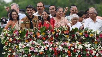 Shubhanshu Shukla with family members and school official during the welcome rally in Lucknow (Photo: Deepak Gupta/HT)