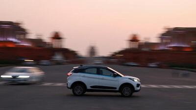 An EV near Rashtrapati Bhavan in New Delhi. (REUTERS)