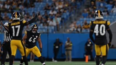 Pittsburgh Steelers defensive tackle Kyler Baugh (65) celebrates as defensive back D'Shawn Jamison (17) and defensive back Kam Alexander (40) walk to join him in the 4th quarter against the Carolina Panthers at Bank of America Stadium. (IMAGN IMAGES via Reuters Connect)