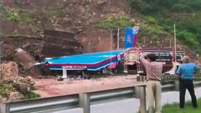 Udhampur: Debris of a petrol pump damaged by a landslide on Jammu-Srinagar highway. (PTI) Udhampur: Debris of a petrol pump damaged by a landslide on Jammu-Srinagar highway. (PTI)