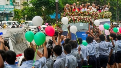 Group Captain Shubhanshu Shukla with his wife Kamna and others during a victory parade as he is welcomed after his historic mission to the International Space Station (ISS), in Lucknow. (PTI) Group Captain Shubhanshu Shukla with his wife Kamna and others during a victory parade as he is welcomed after his historic mission to the International Space Station (ISS), in Lucknow. (PTI)