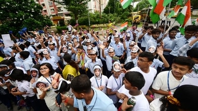 School students with tricolor flags and masks of astronaut Shubhanshu Shukla cheering his return to Lucknow after Axiom mission (Deepak Gupta/ Hindustan Times) School students with tricolor flags and masks of astronaut Shubhanshu Shukla cheering his return to Lucknow after Axiom mission (Deepak Gupta/ Hindustan Times)