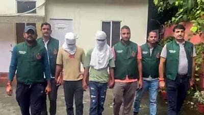 The two arrested sharpshooters on Monday. (ANI Video Grab) The two arrested sharpshooters on Monday. (ANI Video Grab)