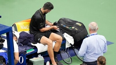 Novak Djokovic, of Serbia, sits on the bench during a match against Learner Tien, of the United States, in the first-round of U.S. Open (AP) Novak Djokovic, of Serbia, sits on the bench during a match against Learner Tien, of the United States, in the first-round of U.S. Open (AP)