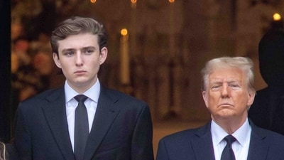 Donald Trump praises his son Barron Trump as a talented soccer player while hosting FIFA President Gianni Infantino. (via REUTER)