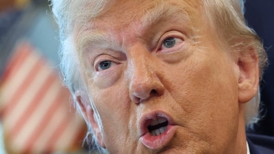US President Donald Trump during the signing of executive orders in the Oval Office at the White House in Washington DC on Monday, 25 August 2025. (Reuters)