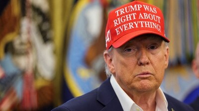 US President Donald Trump wears a 'Trump Was Right About Everything!' hat as he makes an announcement in the Oval Office at the White House in Washington, D.C. (REUTERS File)