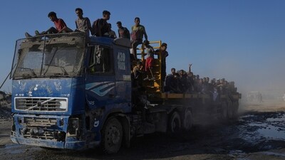 Palestinians ride on a truck used to transport humanitarian aid as it drives to Gaza City from the northern Gaza Strip, Sunday, Aug. 24, 2025. (AP) Palestinians ride on a truck used to transport humanitarian aid as it drives to Gaza City from the northern Gaza Strip, Sunday, Aug. 24, 2025. (AP)