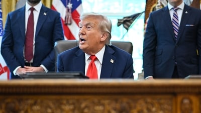 US President Donald Trump speaks to the press after signing some orders in the Oval Office of the White House in Washington on August 25. (AFP) US President Donald Trump speaks to the press after signing some orders in the Oval Office of the White House in Washington on August 25. (AFP)