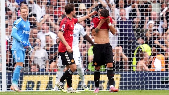 Manchester United's Bruno Fernandes reacts after missing a penalty. (AP)