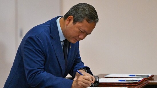 Cambodia's Prime Minister Hun Manet arrived to attend a meeting at the National Assembly building in Phnom Penh where Cambodian lawmakers passed laws allowing for citizenship to be stripped. (AFP)