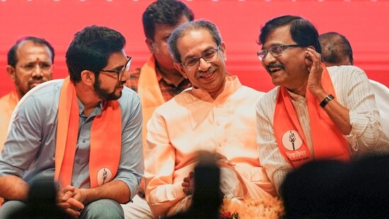 Shiv Sena (UBT) leaders Uddhav Thackeray, Sanjay Raut, and Aaditya Thackeray during the party's Foundation Day function, in Mumbai. (PTI File)
