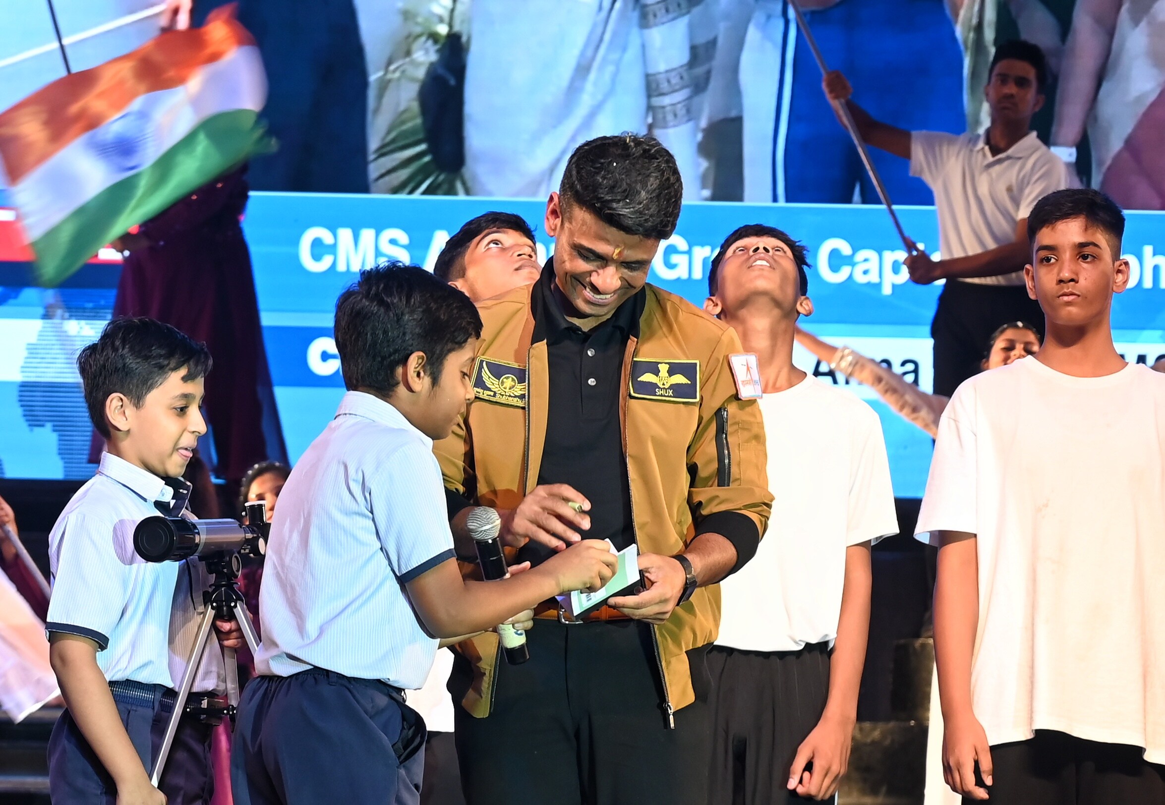 Shubhanshu Shukla signing autographs for students. (Photo: Mustaq Ali/HT)
