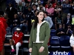 Caitlin Clark #22 of the Indiana Fever walks on the court before a game against the Minnesota Lynx at Target Center Caitlin Clark #22 of the Indiana Fever walks on the court before a game against the Minnesota Lynx at Target Center