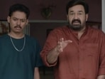 Mohanlal and Sangeeth Prathap in a still from Hridayapoorvam. Mohanlal and Sangeeth Prathap in a still from Hridayapoorvam.
