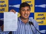 AAP leader Saurabh Bhardwaj's residence was raided as part of the ED's money laundering scheme. AAP leader Saurabh Bhardwaj's residence was raided as part of the ED's money laundering scheme.