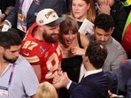 Taylor Swift and Travis Kelce pose together after a Super Bowl game(REUTERS)