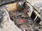 The broken roof and debris seen at the site of the roof collapse in west Delhi’s Dwarka on Monday. (HT photo)