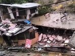 Two houses collapsed due to heavy rain at Balichowk in Mandi district on Tuesday. There was no casualty as they were evacuated earlier. (HT Photo) Two houses collapsed due to heavy rain at Balichowk in Mandi district on Tuesday. There was no casualty as they were evacuated earlier. (HT Photo)