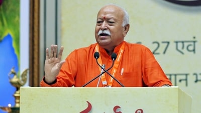 RSS chief Mohan Bhagwat addresses the gathering during an event to mark 100 years of RSS at Bharat Mandapam, in New Delhi on Tuesday. (ANI) RSS chief Mohan Bhagwat addresses the gathering during an event to mark 100 years of RSS at Bharat Mandapam, in New Delhi on Tuesday. (ANI)