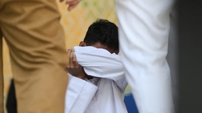 The court in Aceh sentenced the men to 80 strikes each. (AP) The court in Aceh sentenced the men to 80 strikes each. (AP)