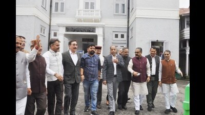 Leader of Opposition Jai Ram Thakur along with BJP legislators staging a walkout from assembly during the Himachal Pradesh Vidhan Sabha monsoon session, in Shimla on Tuesday. (Deepak Sansta/ HT)