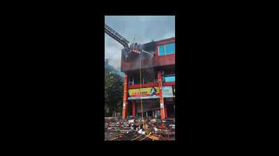 Preliminary reports suggest the fire may have been triggered by a short circuit, though police said CCTV footage is being reviewed to ascertain the exact cause. (HT Photo) Preliminary reports suggest the fire may have been triggered by a short circuit, though police said CCTV footage is being reviewed to ascertain the exact cause. (HT Photo)