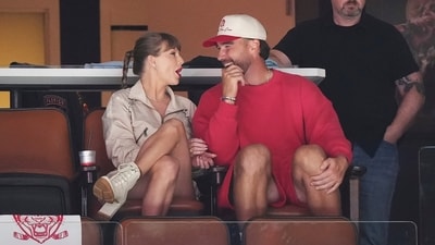Singer Taylor Swift, left, and Kansas City Chiefs football player Travis Kelce, front right (AP) Singer Taylor Swift, left, and Kansas City Chiefs football player Travis Kelce, front right (AP)