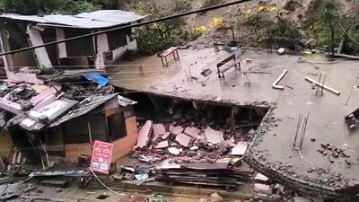 Two houses collapsed due to heavy rain at Balichowk in Mandi district on Tuesday. There was no casualty as they were evacuated earlier. (HT Photo)