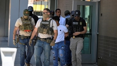 A file photo of ICE agents taking people into custody at an immigration court in Phoenix, Arizona in May 2025. (REUTERS)
