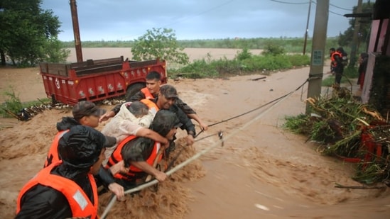 Jammu weather LIVE updates: Several rescue columns of the Indian Army were deployed across the region, with forces evacuating people from low-lying and at danger-areas. Jammu weather LIVE updates: Several rescue columns of the Indian Army were deployed across the region, with forces evacuating people from low-lying and at danger-areas.