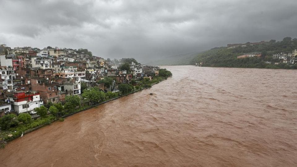 The swollen Tawi river in Jammu on Tuesday. Almost all rivers and streams are flowing above or close to the danger mark, submerging a number of low-lying areas and roads in the city and elsewhere.